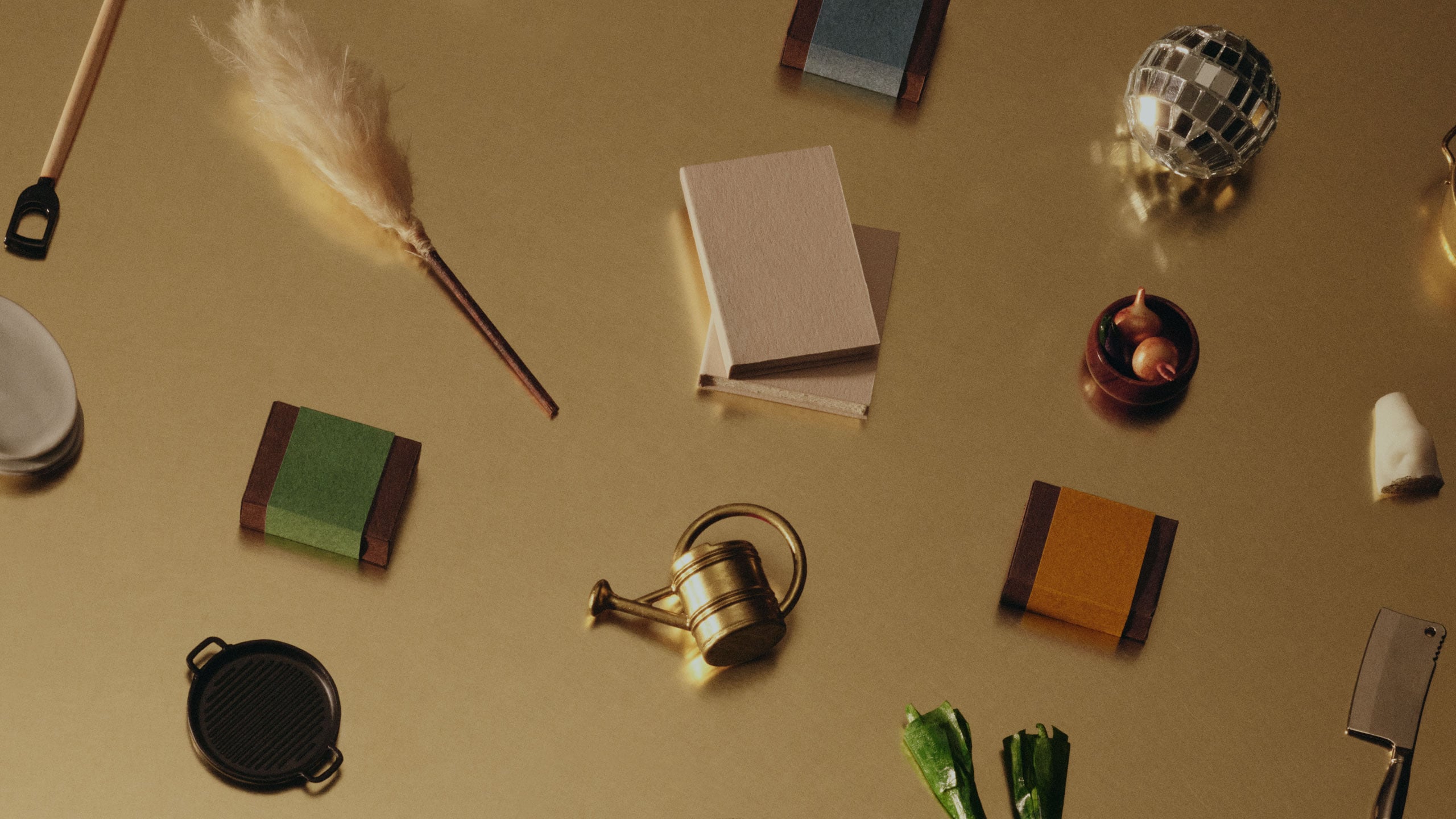 Aesop festive gift kits and seasonal ornaments on a brass countertop.